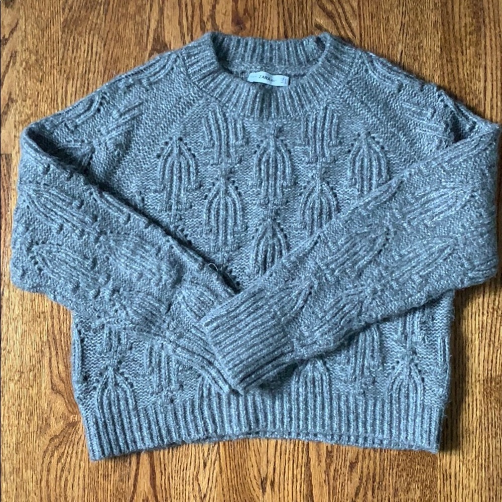 Chunky knit. Ribbing at cuffs & hem.